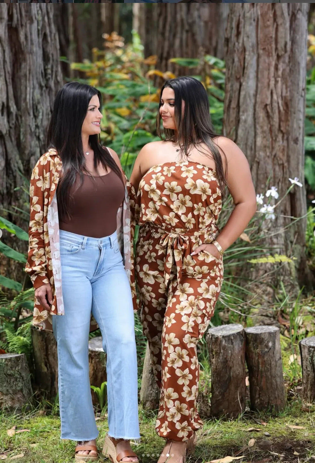 Marcel Rodrigues, founder of Wehi's Boutique, with her daughter Ani, in a Hāmākua redwood grove, both in Wehi original prints.
